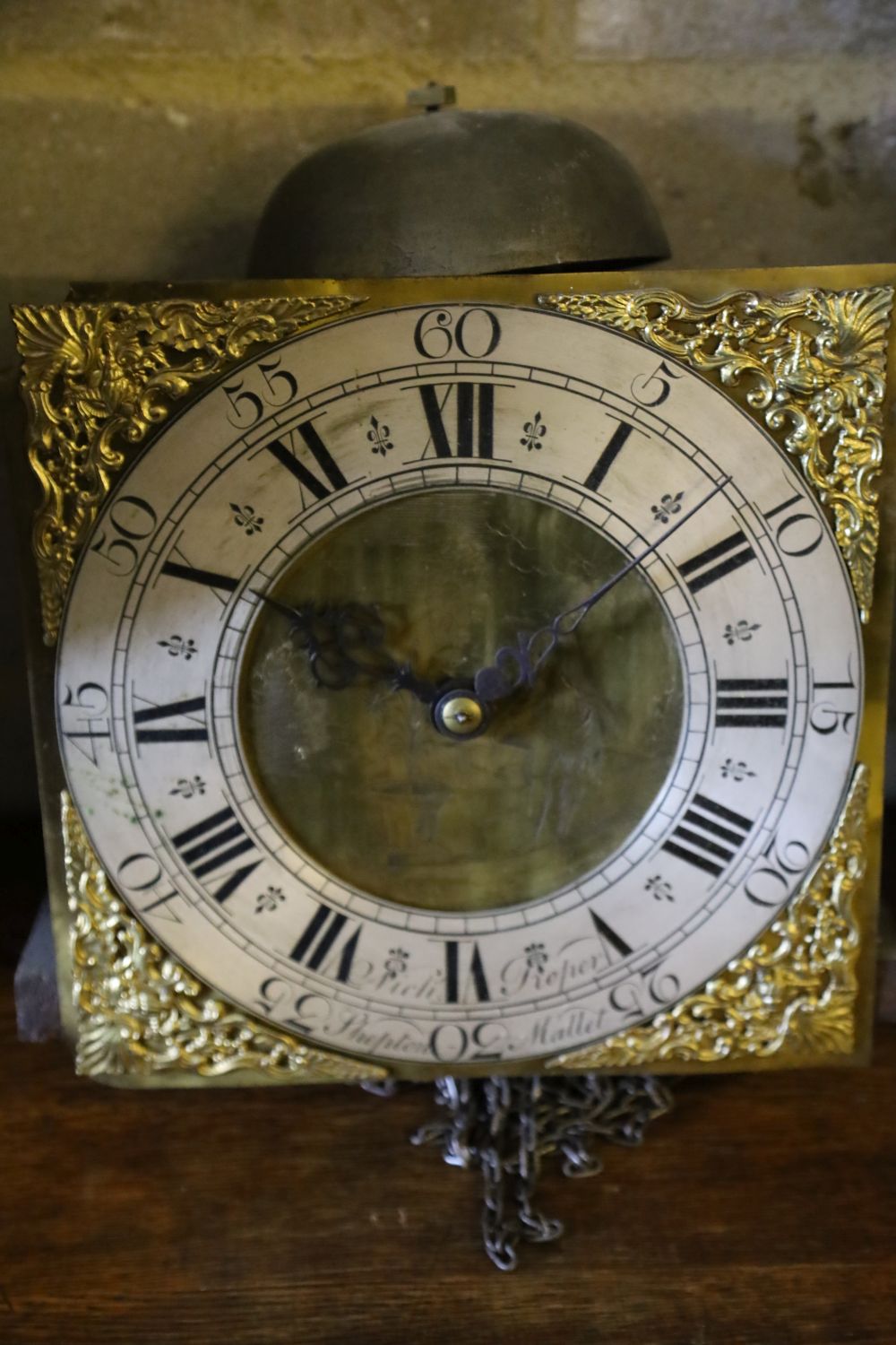 An 18th century oak cased thirty hour wall clock, marked Nick & Roper, Shepton Mallet